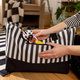 BABY EINSTEIN Hryzačka s hrkálkou zebra Zen™ Shake-a-Shape bez BPA 0m+