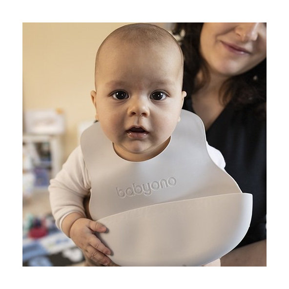 BABYONO Podbradník mäkký plastový s vreckom bez BPA pink 6m+